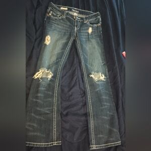 Womens Distressed Blue Jeans